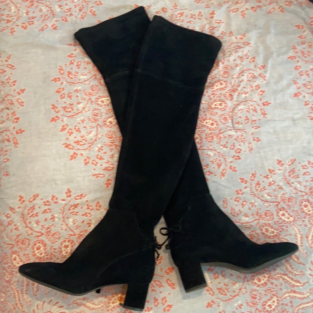 Tory Burch thigh high boots.